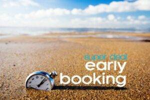 A pocket watch on a sandy beach with 'super deal early booking' text, symbolizing timely cruise booking deals for exotic destinations like the Caribbean and Mediterranean.