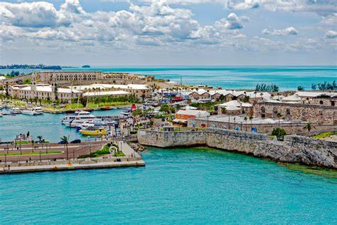 Scenic view of a port with historic buildings and boats in Nassau, Bahamas.