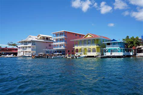 Colorful waterfront buildings in Bocas del Toro, Panama with clear blue water