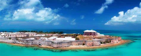 Aerial view of historic fort surrounded by turquoise waters in the Bahamas.