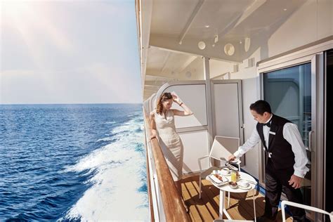 This image showcases a luxurious cruise ship cabin with a panoramic window view of a breathtaking snowy landscape. The elegantly designed cabin provides a perfect blend of comfort and sophistication, ideal for a memorable sea voyage. Perfect for romantic getaways, family vacations, or group travel, this cabin offers all the amenities needed for a relaxing and enjoyable cruise experience. Discover the best cruise deals, book a suite or stateroom, and enjoy the unparalleled views and luxury onboard. Plan your dream cruise with our travel agency and embark on an adventure filled with scenic beauty, comfort, and top-notch service.