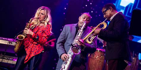 Jazz musicians performing live on stage during a cruise event