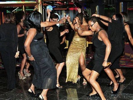 Group of women dancing and enjoying a party on a cruise ship