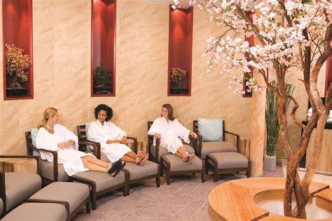 Three women relaxing in a luxurious spa lounge onboard a cruise ship