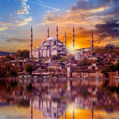 Sunset view of the Blue Mosque with its reflection in the water in Istanbul, Turkey